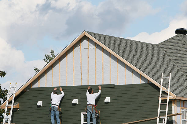 Professional Storm Damage Siding Repair technician working in Grandy, NC